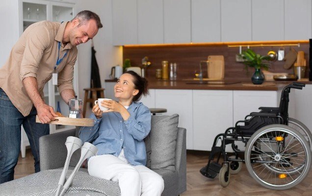 Caregiver performing NDIS household tasks Sydney